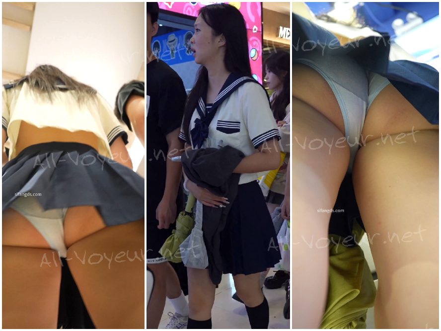 洋服店のCDデニムスカートの女の子…白の細袖トップスに陰毛露出、前面と背面の写真。