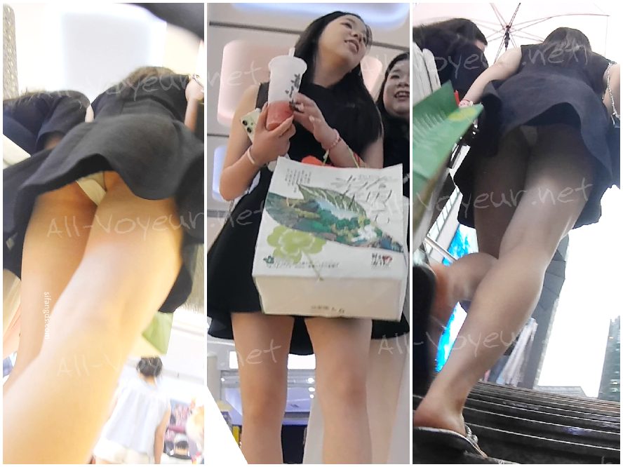 151 - 白くて形のよいお尻と張りのある臀部を持つ女性が、白いぴったりした下着を身につけて誘惑的なポーズをとっています。