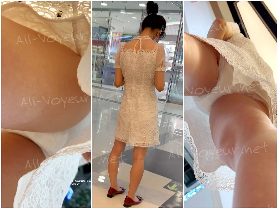 【KFC】短いスカートの美女が服を買う。白い透けた下着で前面の黒い部分が見える。