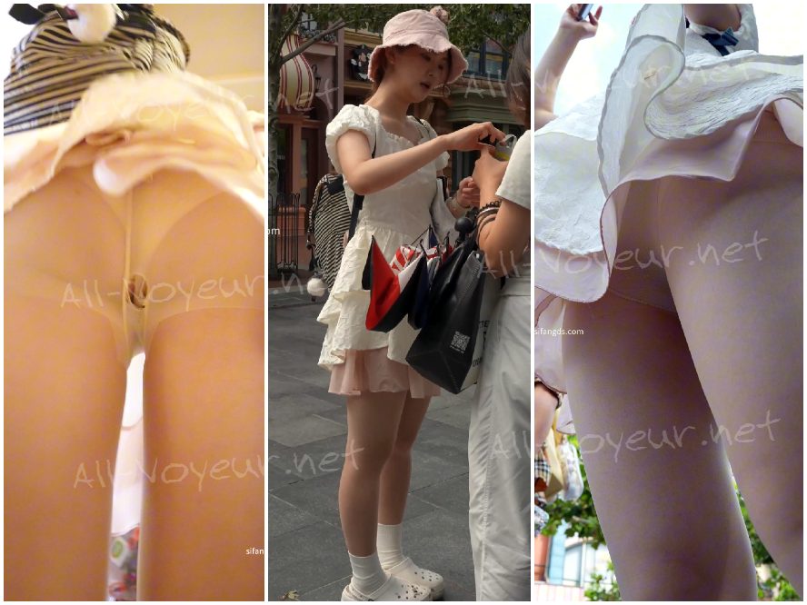 レースのプリンセスドレスを着た若い女性がかがむと、シームレスインナーレンズが取り付けられたCDが階段を上っていきます。