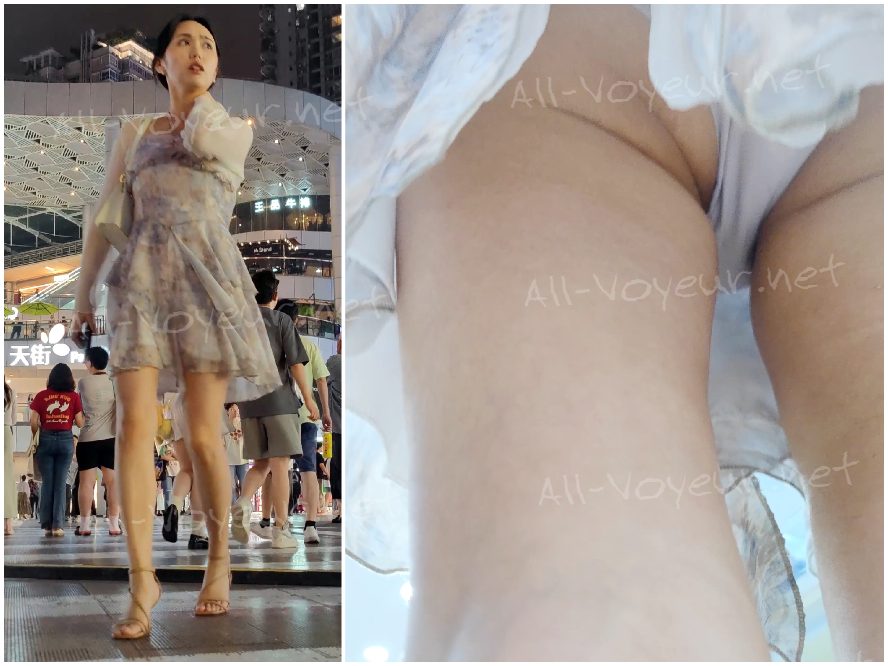 白いドレスを着て眼鏡をかけ、灰色の下着を身につけた若い女性が散歩に出かけていた。