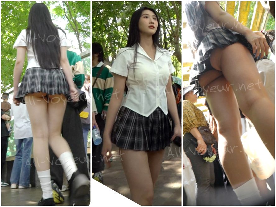 (原文:孔成)超ミニ丈のケーキスカートを履いた若い女性が買い物に出かける。セクシーな黒いドレスが彼女の肉感的なお尻を覆っている。