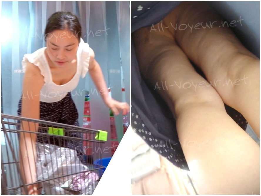 （原文：孔成）花柄のワンピースに眼鏡をかけた若い女性が子供を連れて買い物に出かける。彼女のふっくらとしたお尻は、継ぎ目のないスカイブルーのNシャツで覆われている。